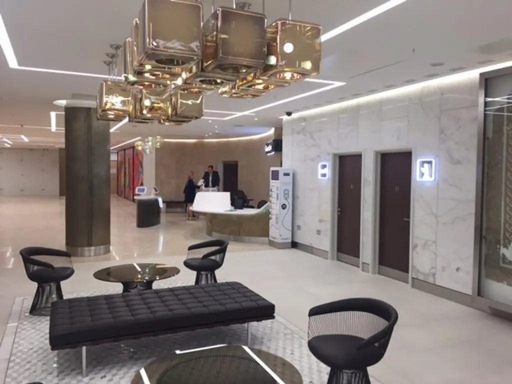 Hotel lounge with bespoke reception joinery and fitted wall panels